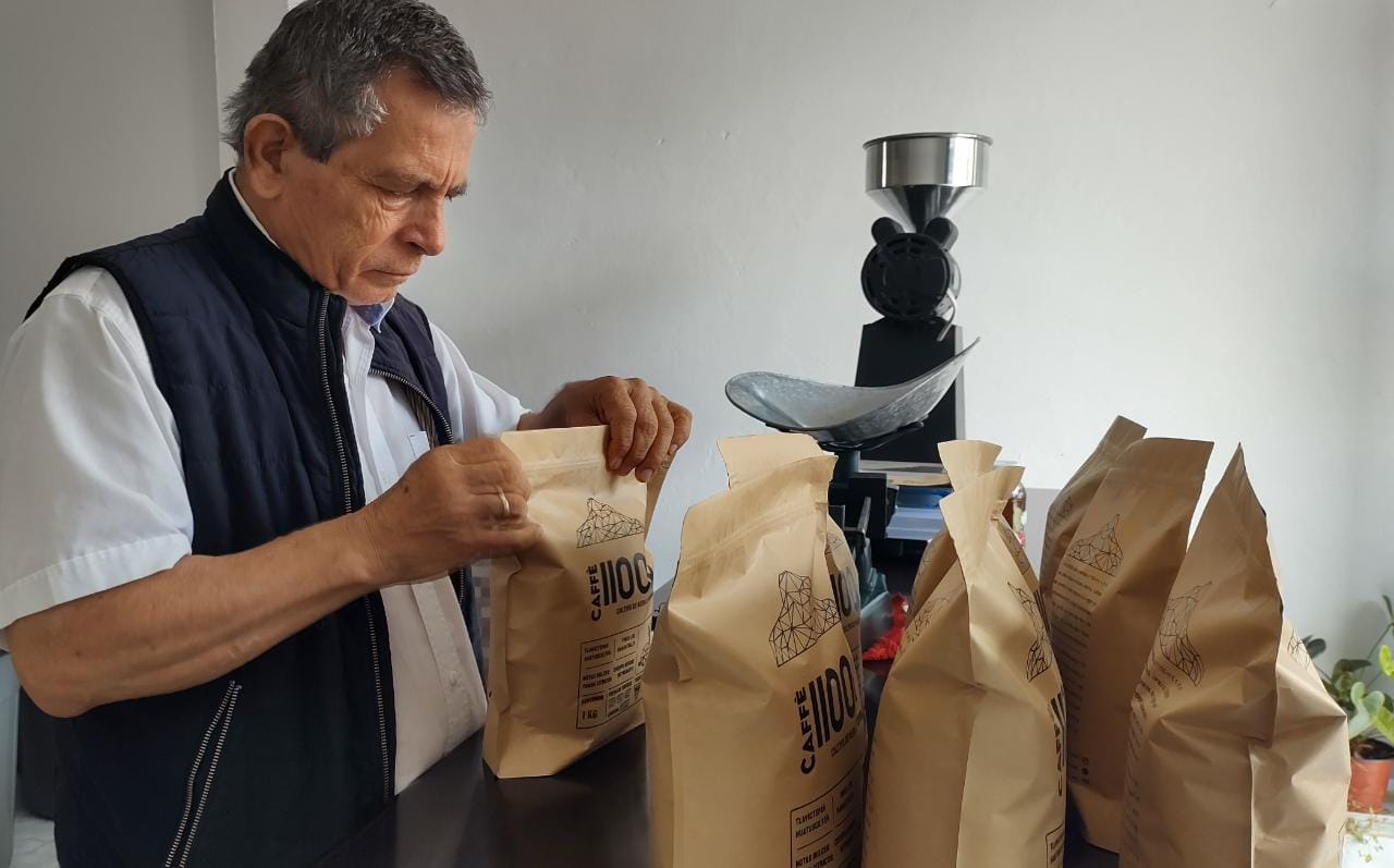 Jesus's father preparing bags of Caffè 1100m coffee